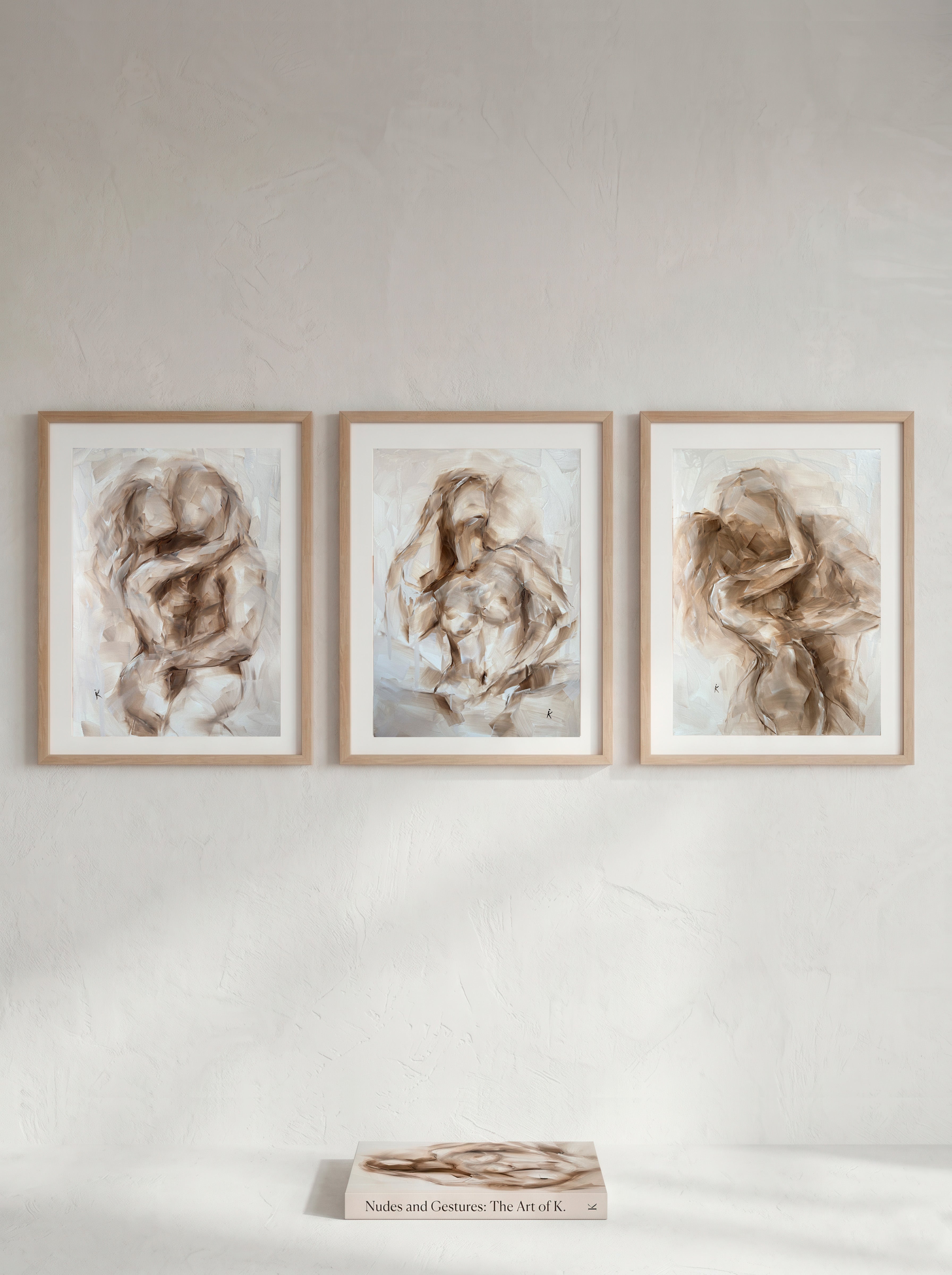 Warm neutral figurative oil painting set of three on a wall