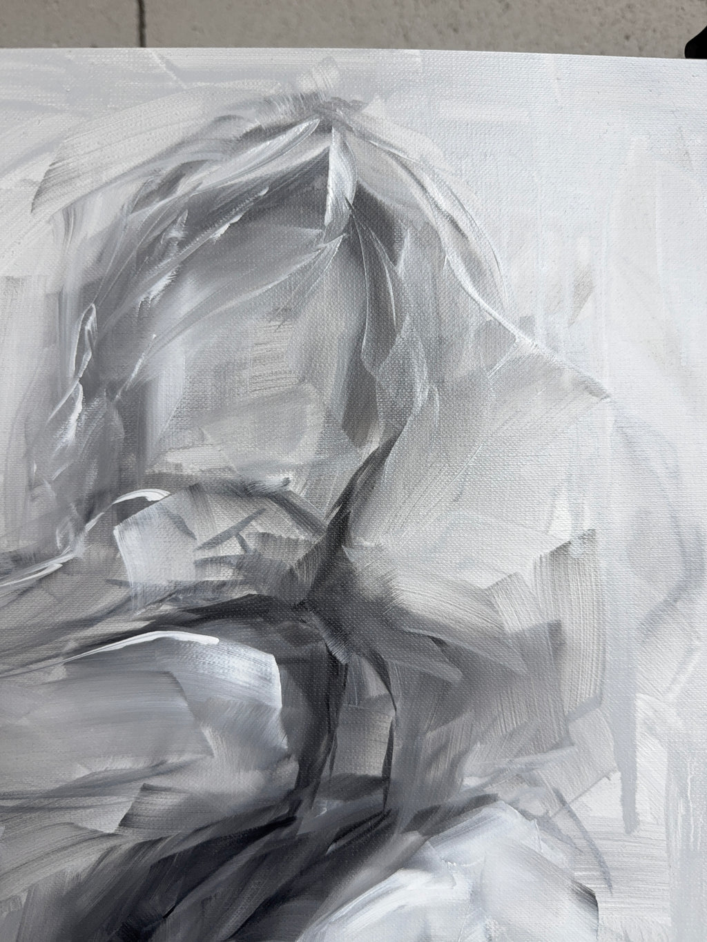 Close-up of expressive brushwork, monochrome figure painting