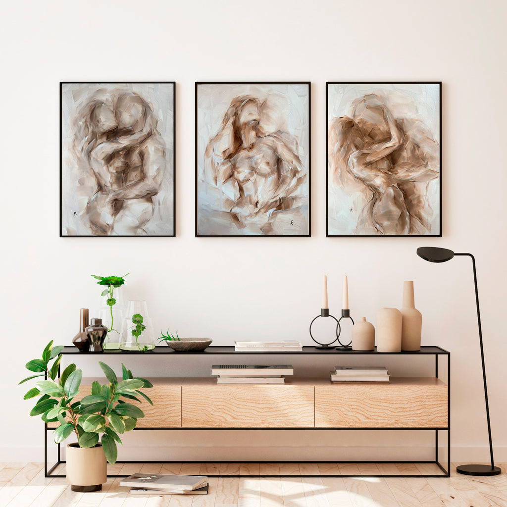 Neutral figurative wall art styled in a modern living room