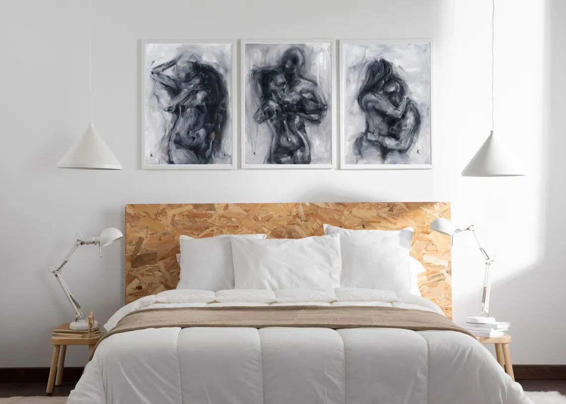 Set of three charcoal prints of embracing figures above a bed