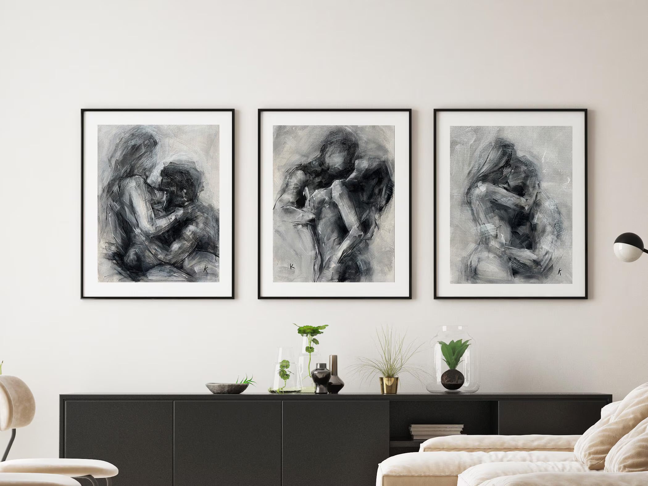 Minimalist gallery wall set in a neutral modern bedroom